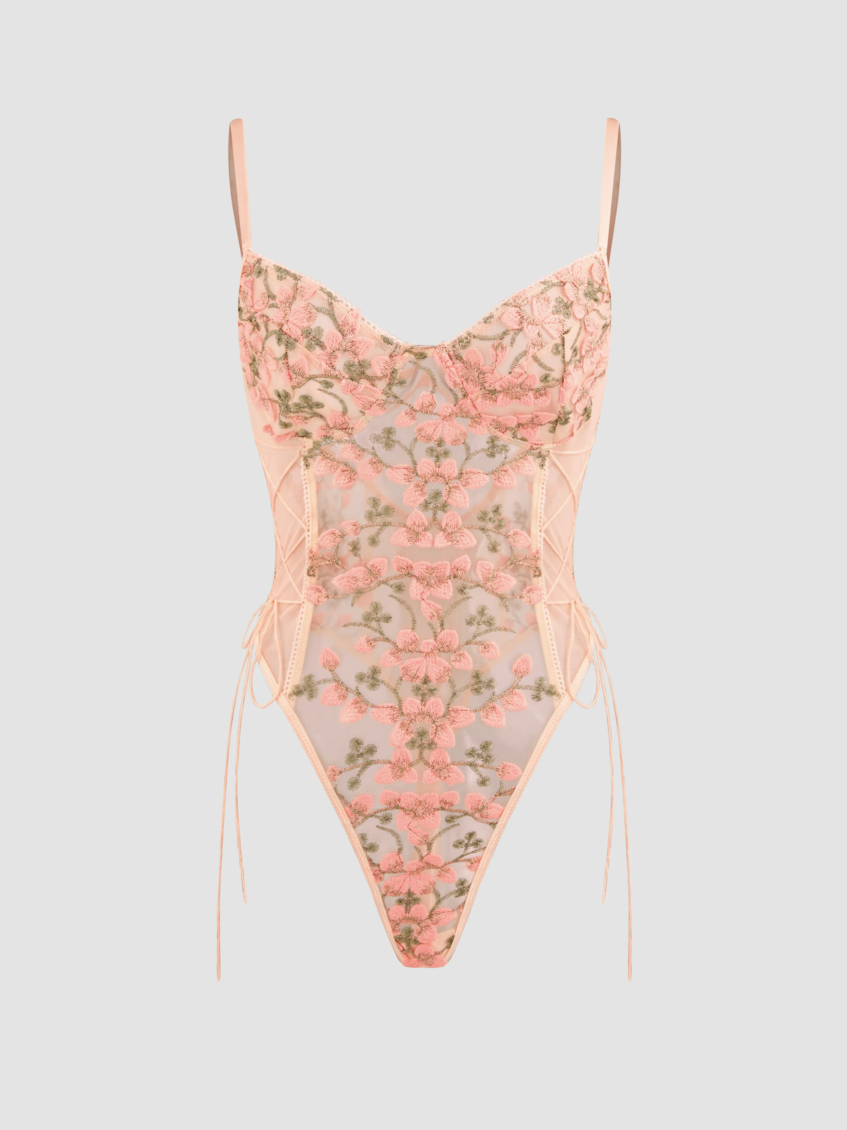 Body de encaje floral con cuello en V y transparencias