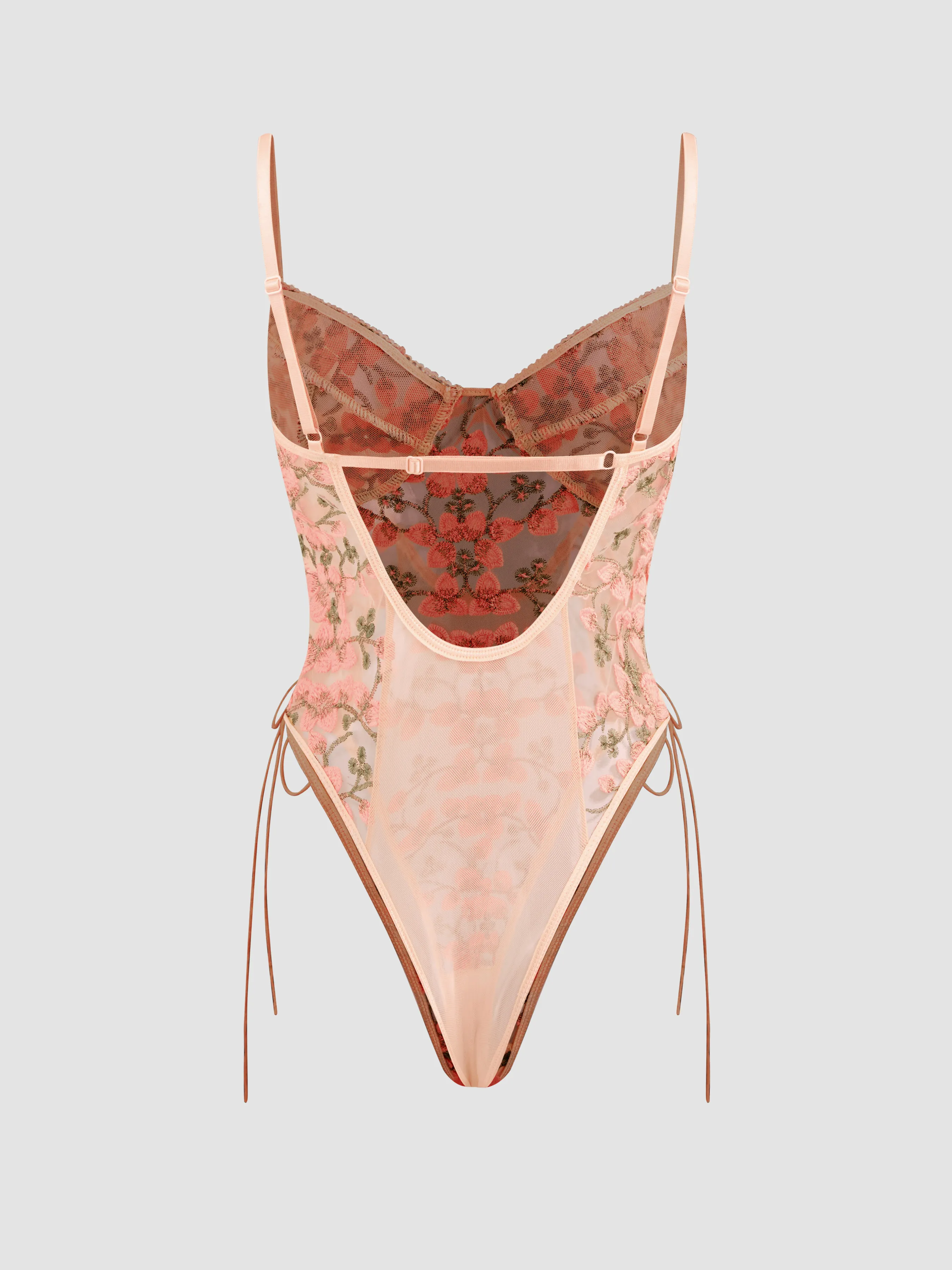Body de encaje floral con cuello en V y transparencias