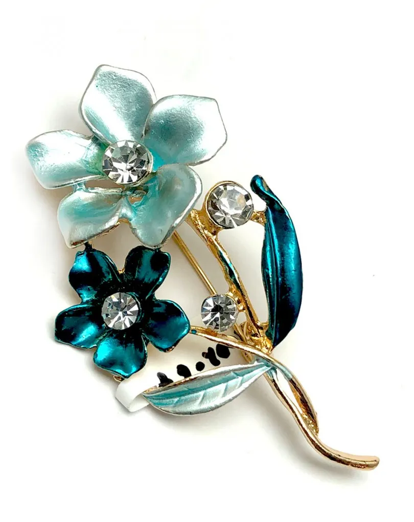 BROCHES DE MUJER DE BISUTERIA CON BONITAS FLORES AZULES