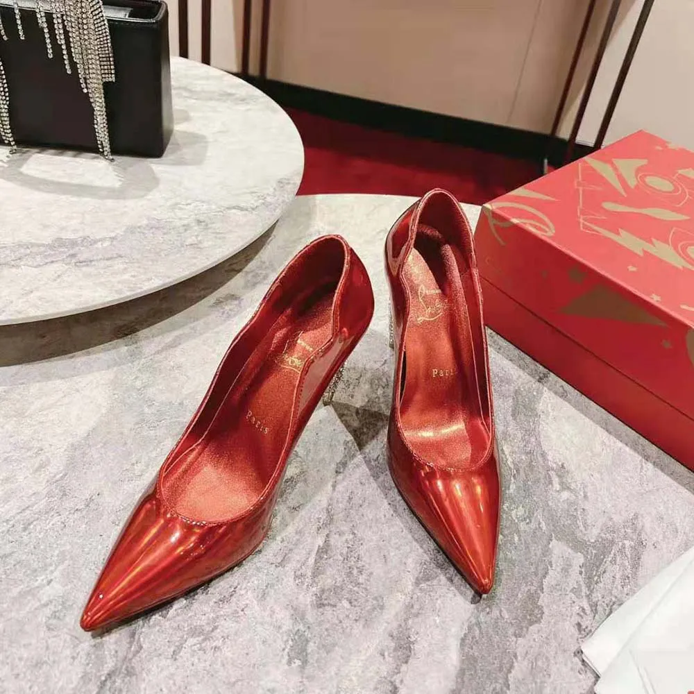 CHRISTIAN LOUBOUTIN MUJER LIPSTRASS BOMBA 100 MM ALTURA DEL TACóNROJO