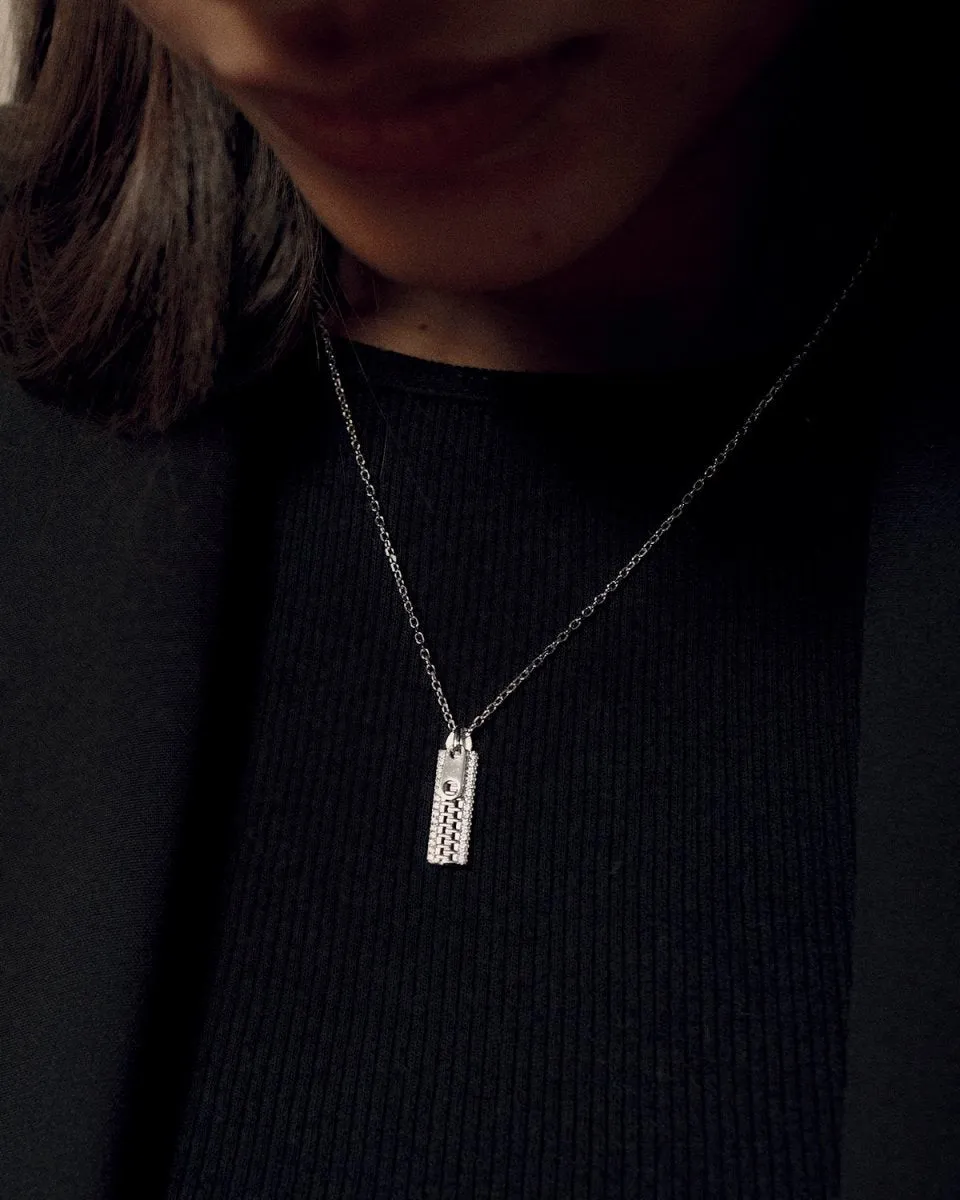 Colgante brillante de plata cremallera mini y circonita