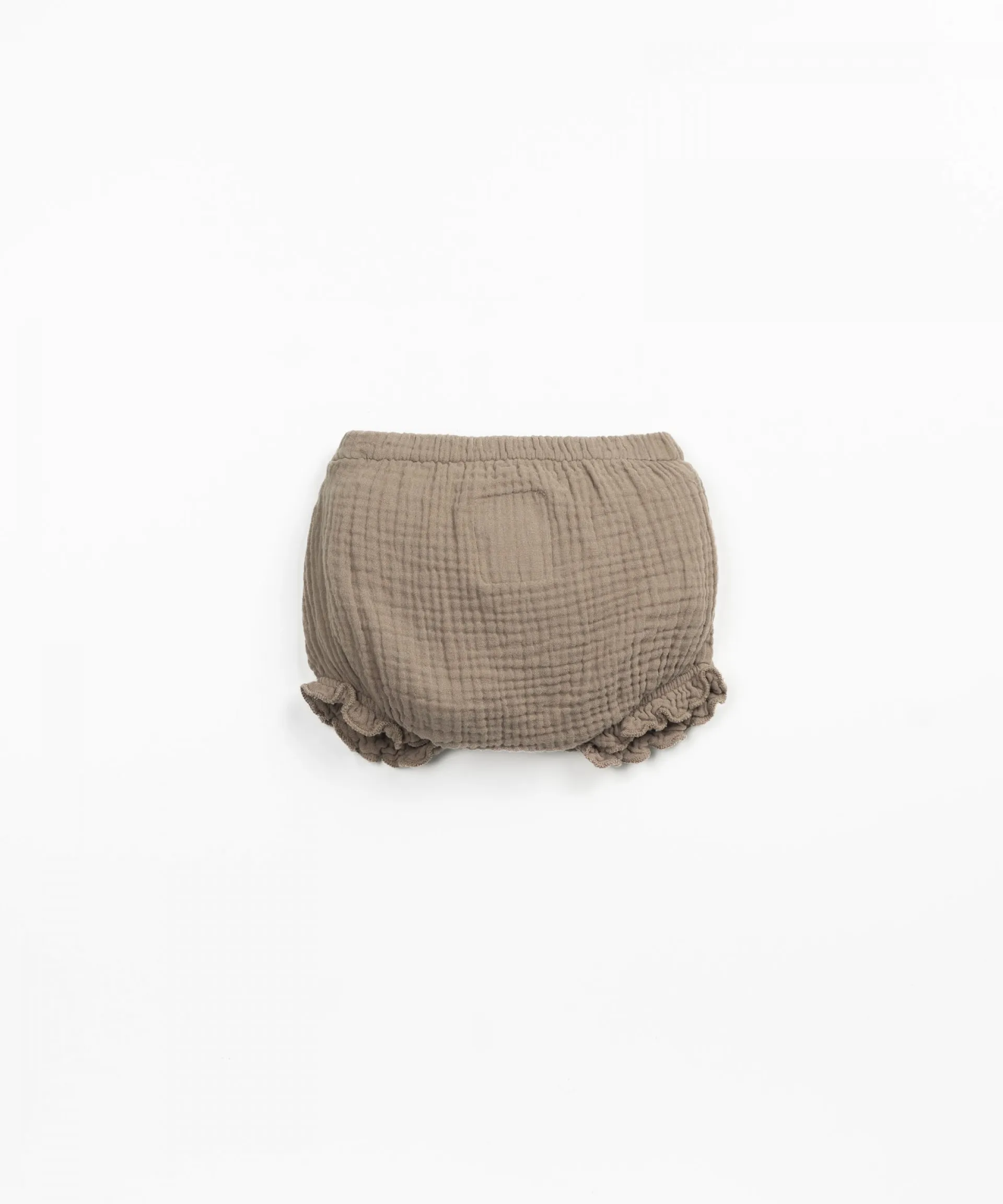 Cubrepañal con botón de coco de adorno | Textile Art