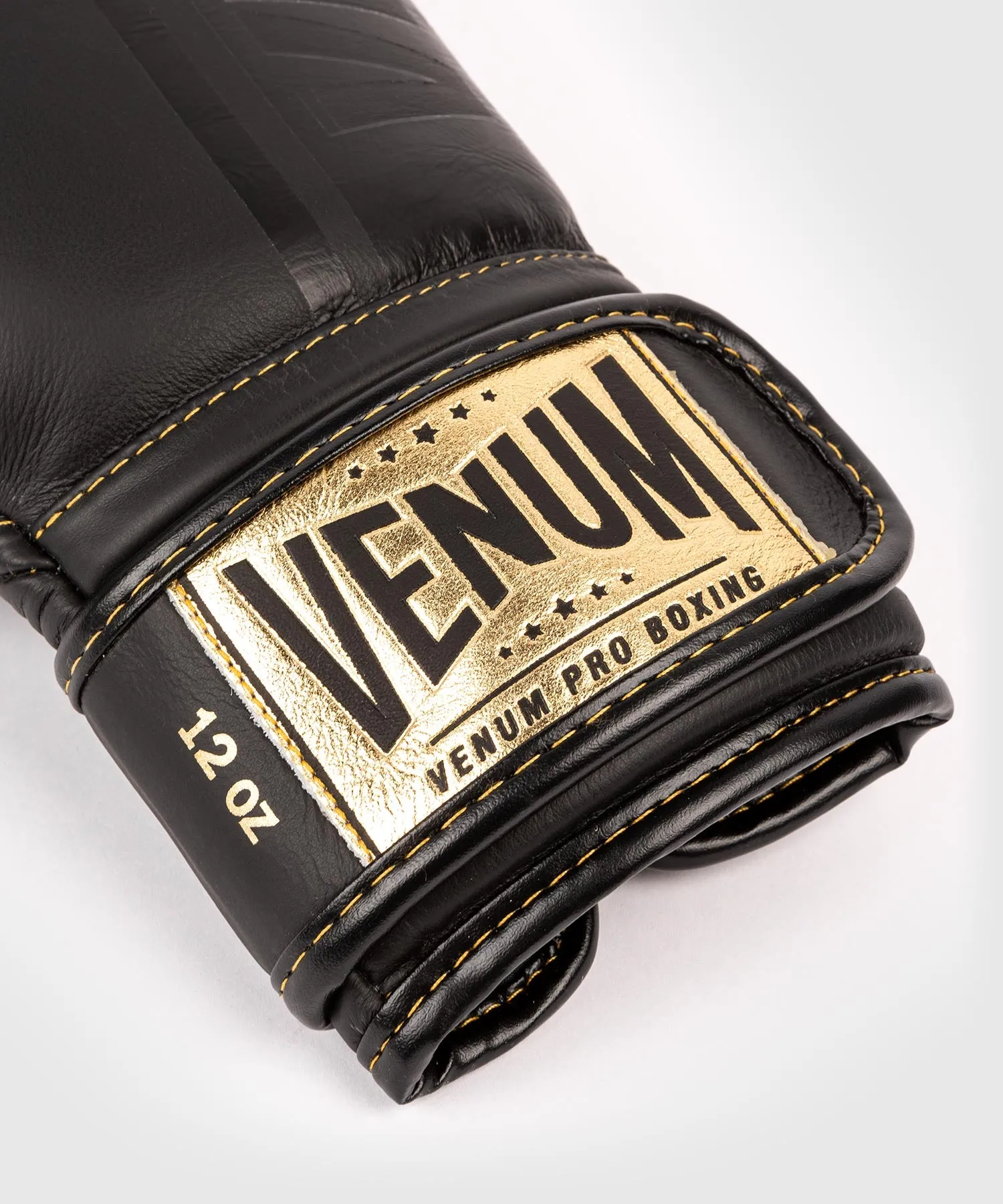 GUANTES DE BOXEO PROFESIONAL VENUM SHIELD – VELCRO  NEGRO/NEGROORO