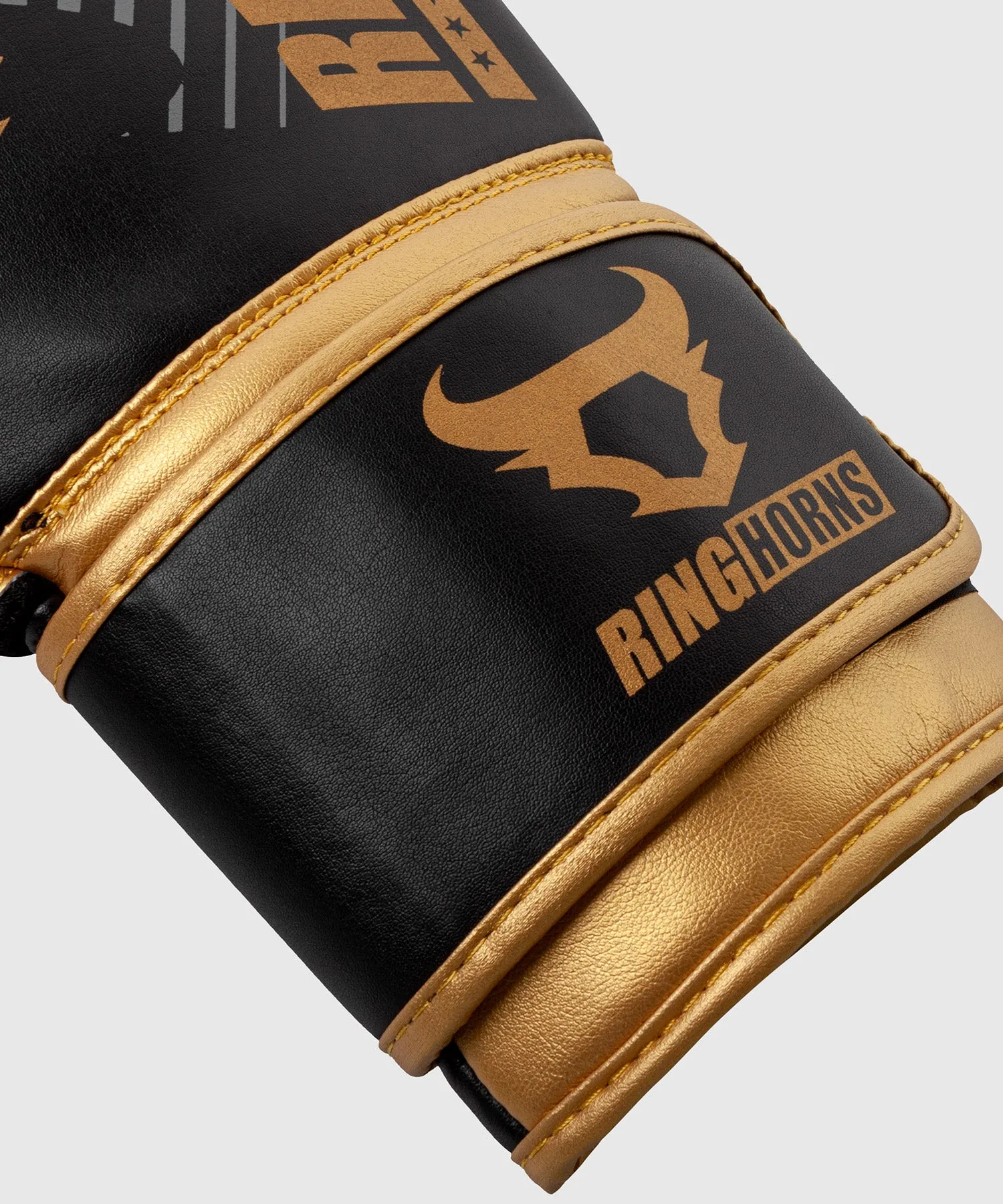 GUANTES DE BOXEO RINGHORNS CHARGER MX  NEGRO/ORO