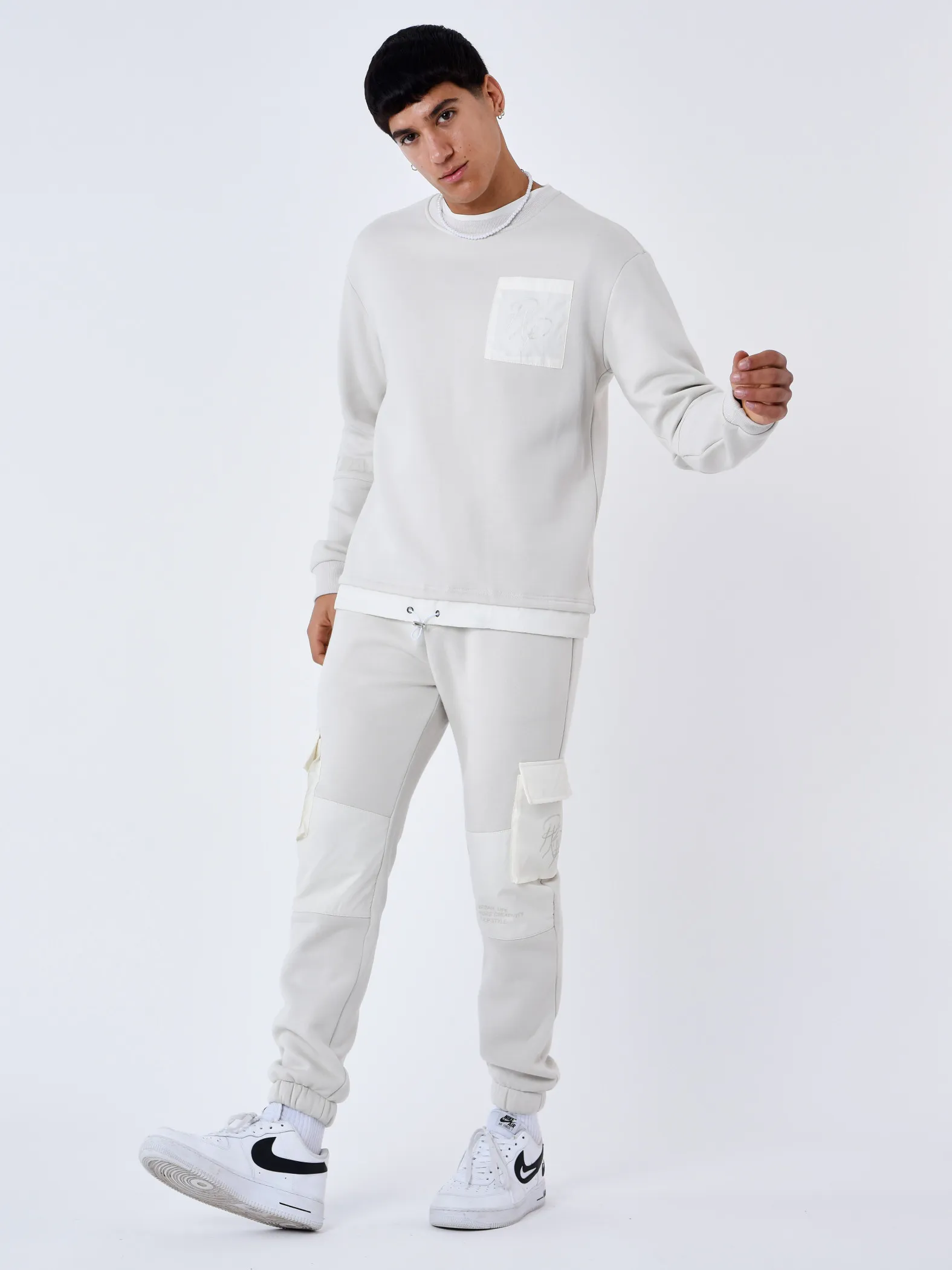 Pantalones de chándal con bolsillos reflectantes