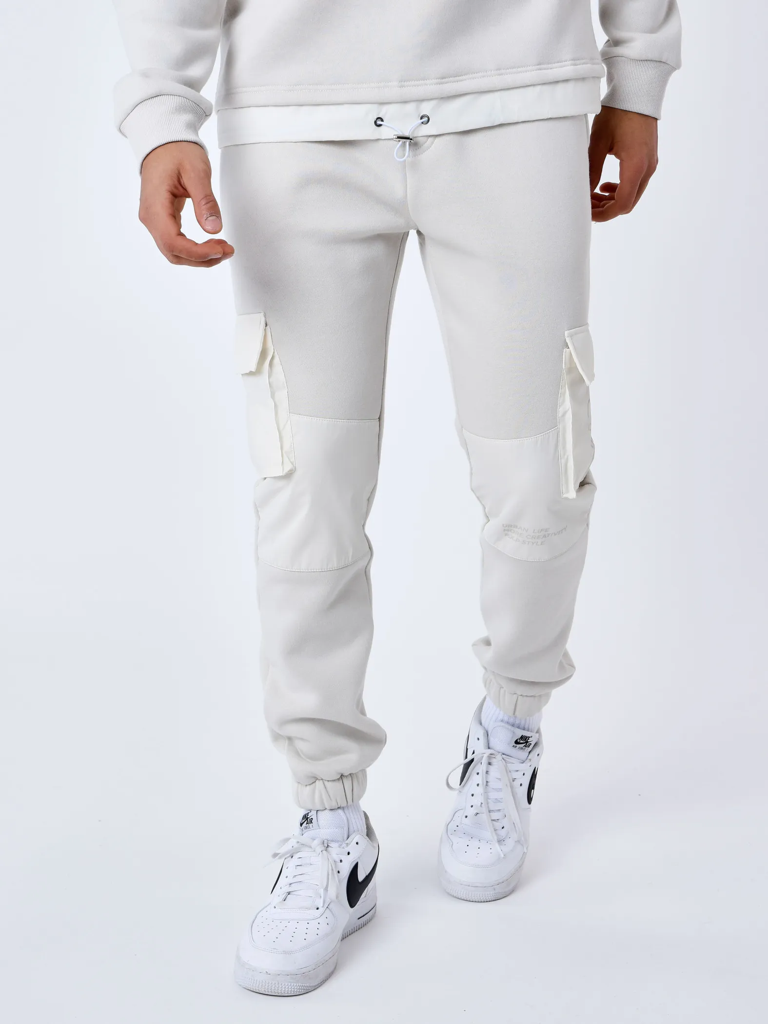Pantalones de chándal con bolsillos reflectantes