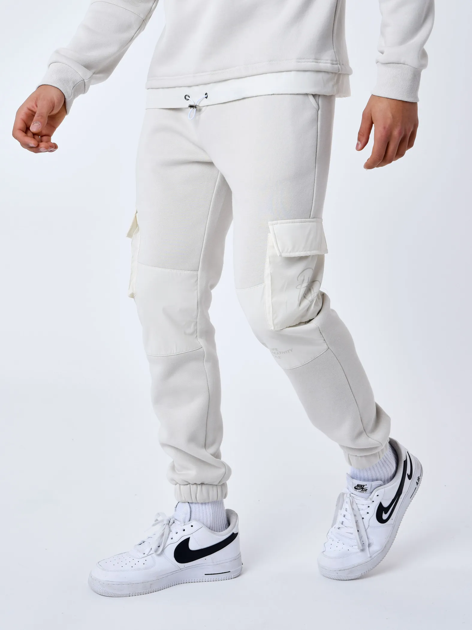 Pantalones de chándal con bolsillos reflectantes