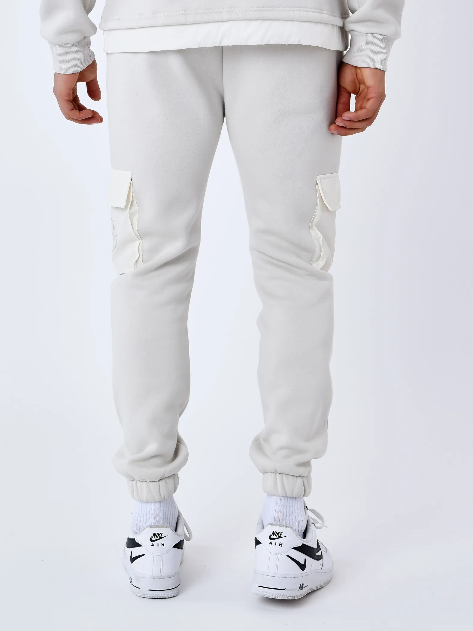 Pantalones de chándal con bolsillos reflectantes