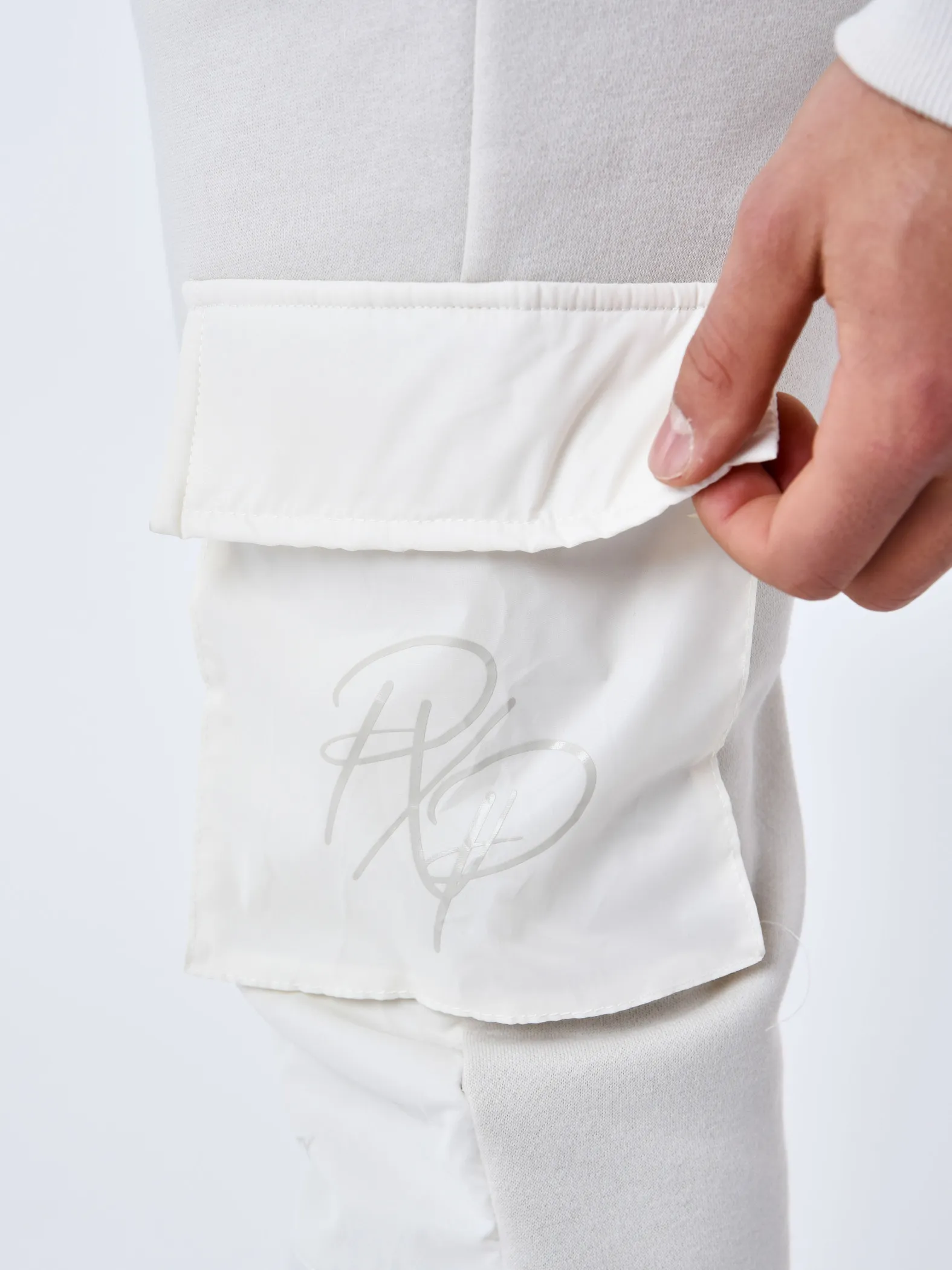 Pantalones de chándal con bolsillos reflectantes