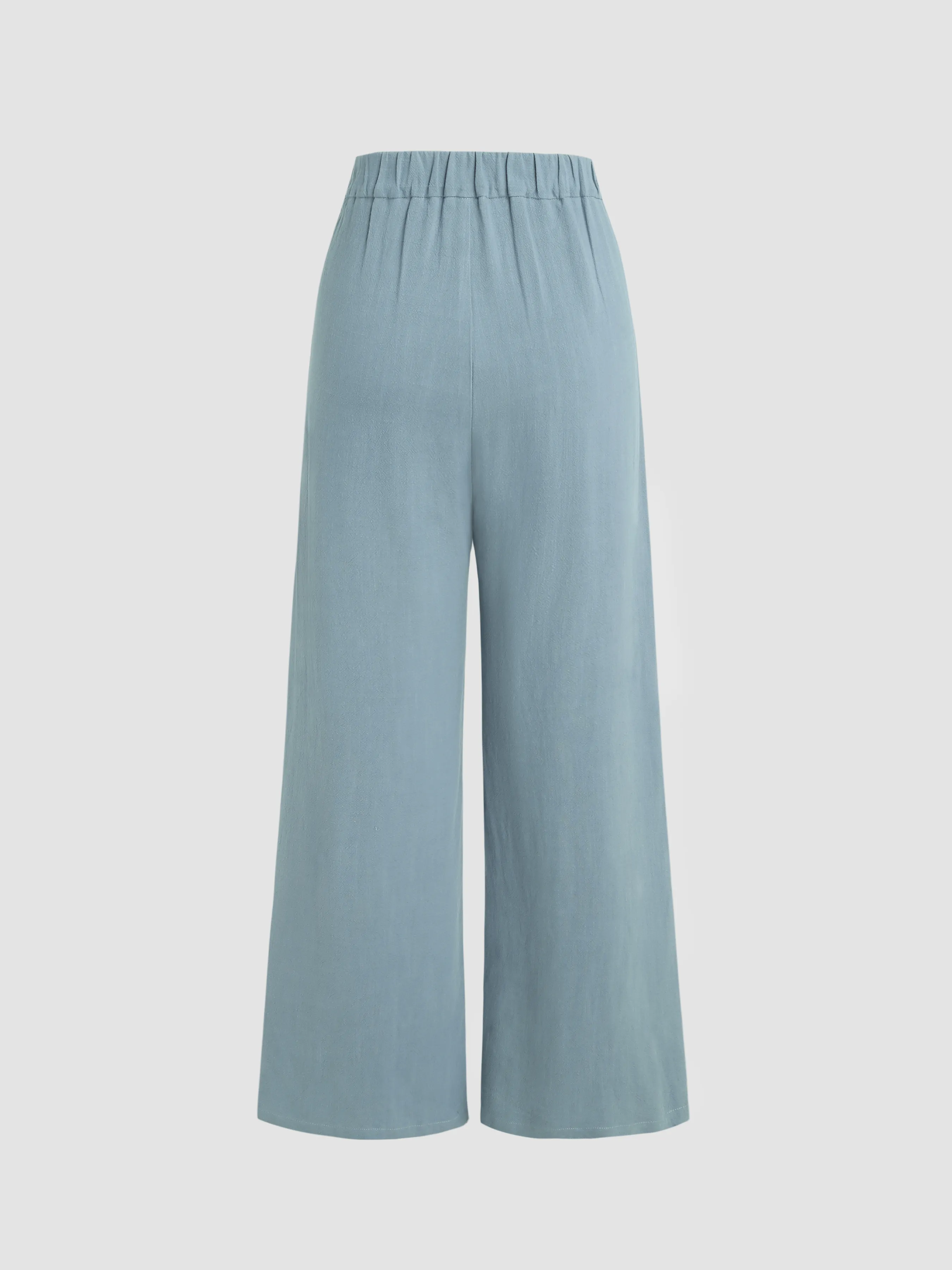 Pantalón de cintura elástica con botones de pierna ancha
