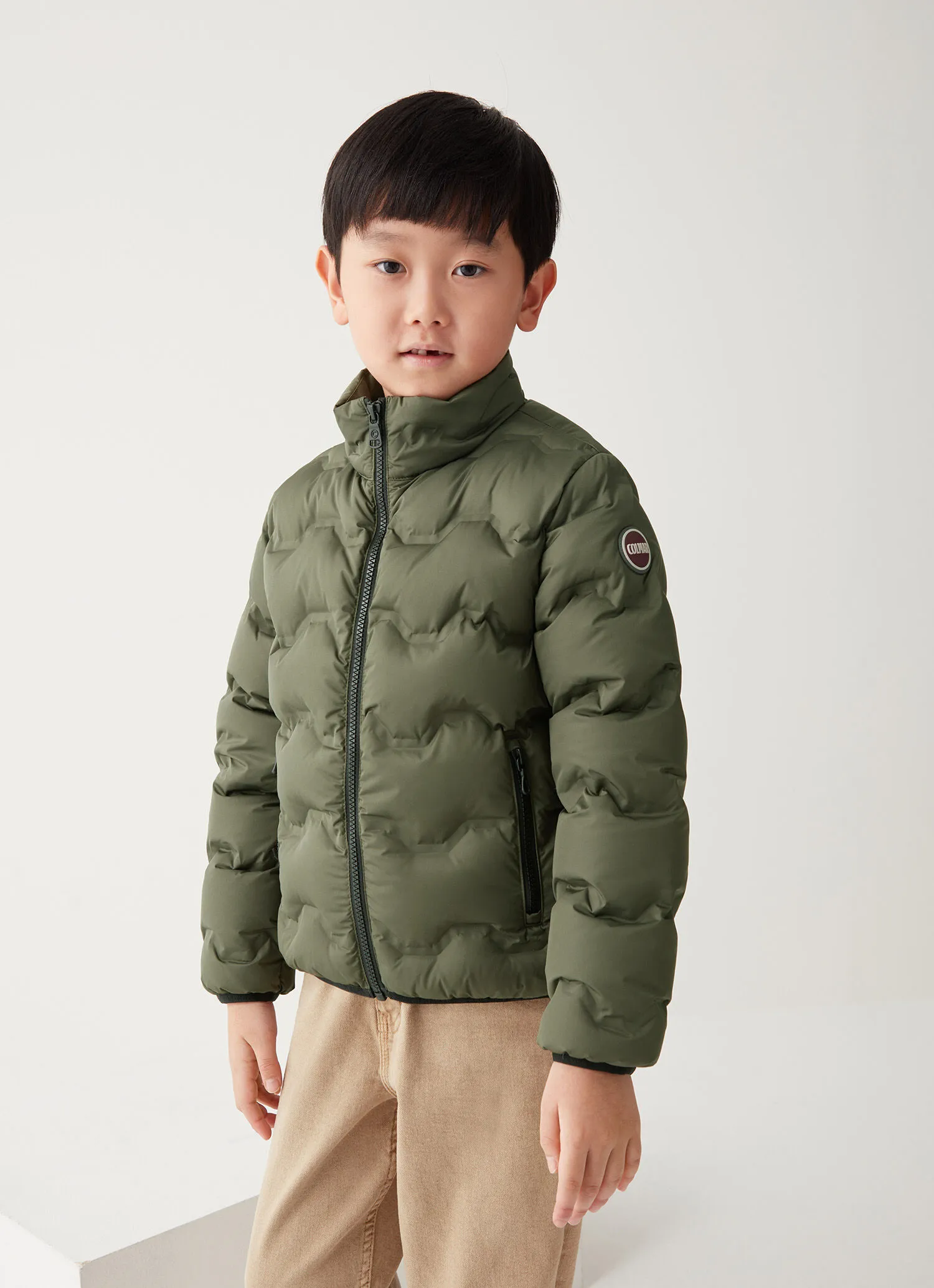 Plumífero de efecto acolchado modelo bomber
