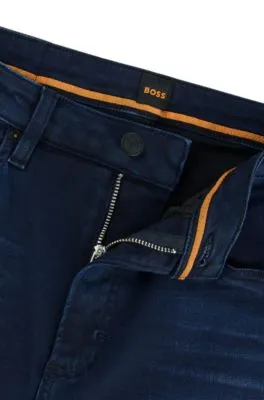Vaqueros acampanados slim fit en tejido vaquero elástico azul