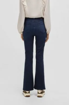 Vaqueros acampanados slim fit en tejido vaquero elástico azul