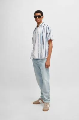 Vaqueros regular fit de denim rígido azul