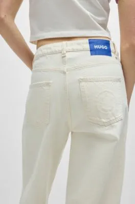 Vaqueros relaxed fit de denim desgastado y pernera ancha