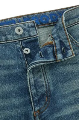 Vaqueros tapered fit de denim teñido azul