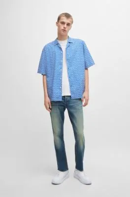 Vaqueros tapered fit de denim teñido azul