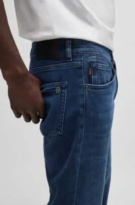 Vaqueros tapered fit en cómodo tejido denim elástico azul puro