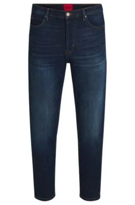Vaqueros tapered fit en denim elástico azul muy cómodo