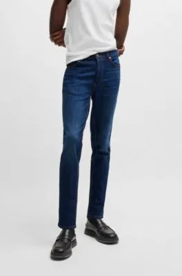 Vaqueros tapered fit en denim elástico azul muy cómodo