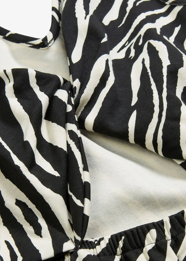 Vestido camisero con detalle en la espalda Negro/crudo con estampado de cebra